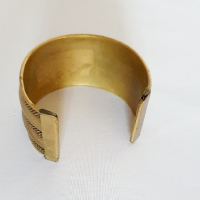 Goudkleurige slavenarmband